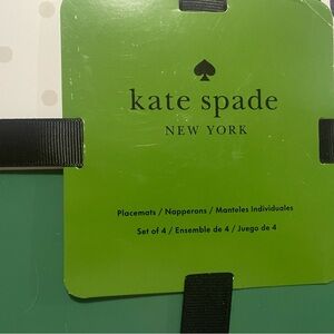 Kate Spade Placemats set of four. They say “Cheers Darling”